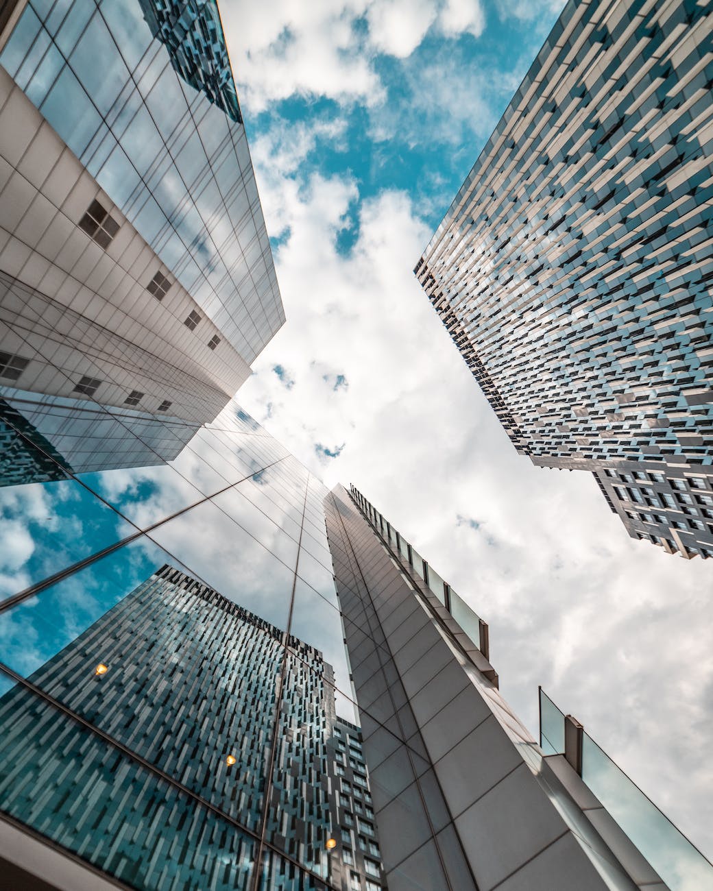 low angle photography of glass buildings